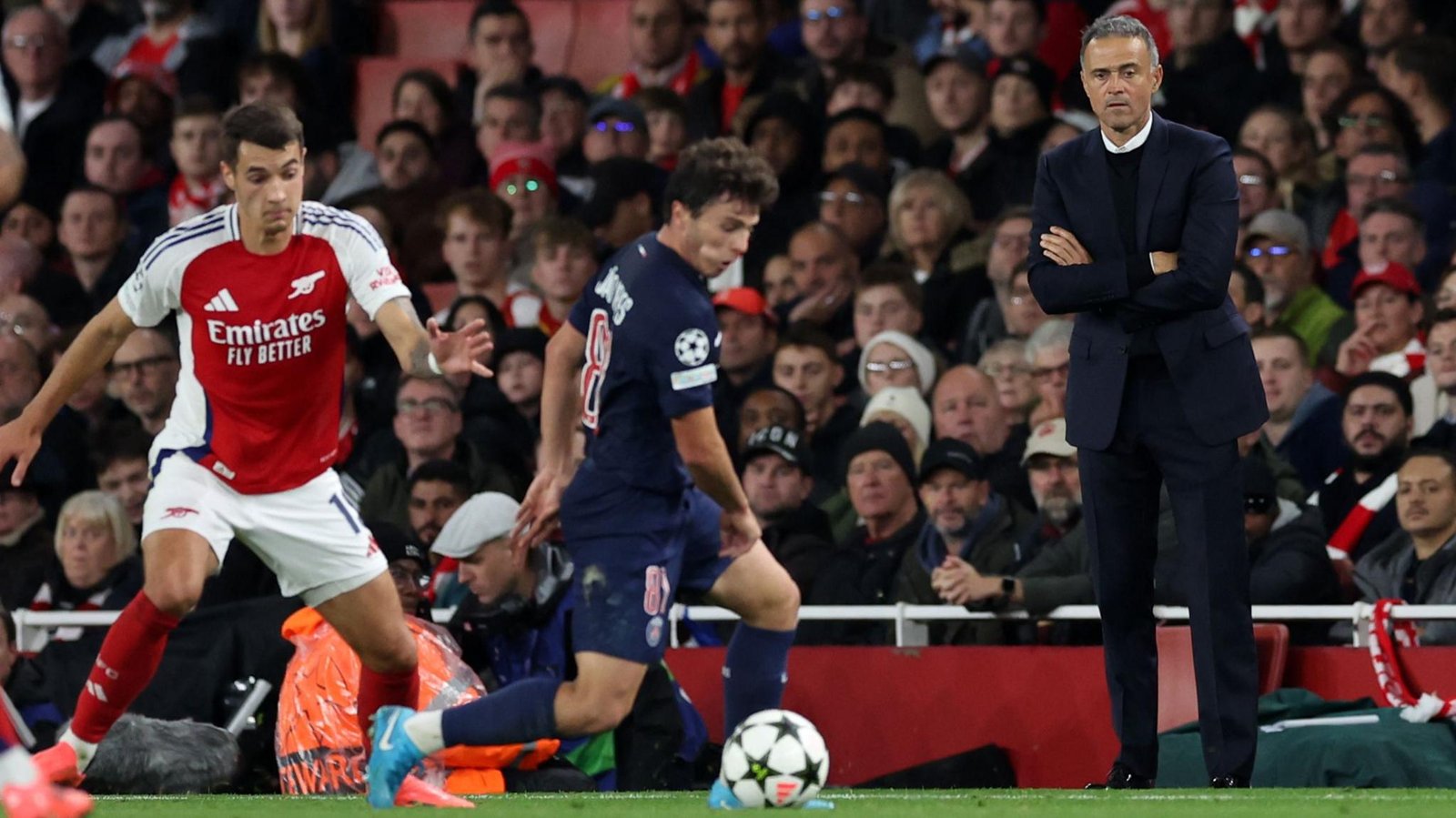 Luis Enrique watches on as Paris St-Germain face Arsenal in Champions League
