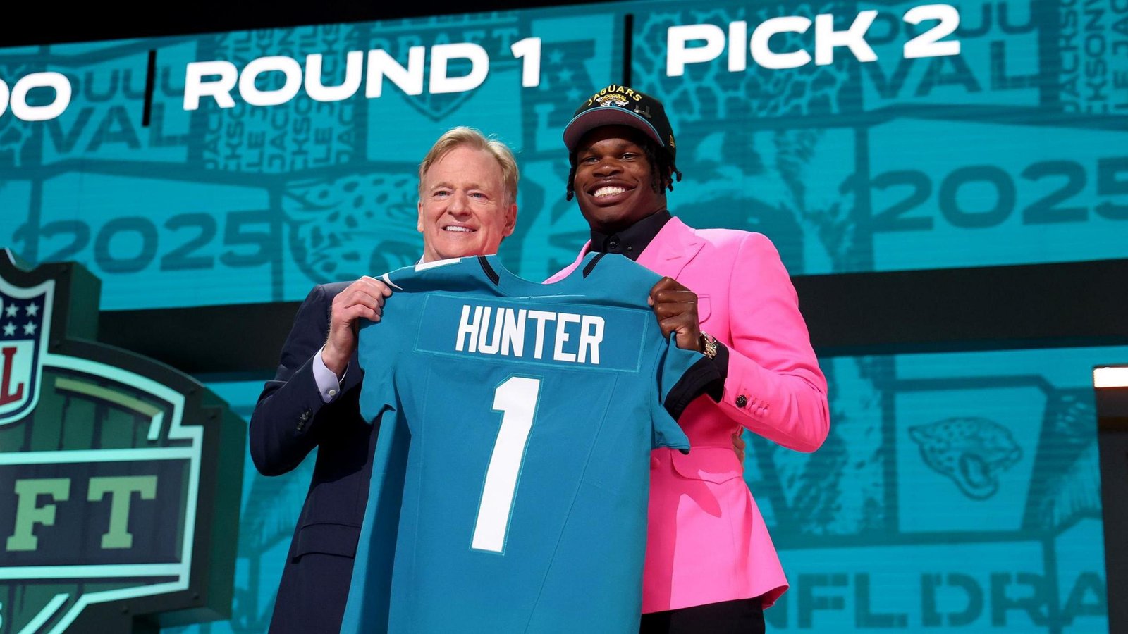 Travis Hunter and NFL commissioner Roger Goodell at the 2025 draft in Green Bay