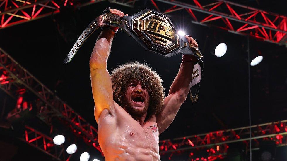 Merab Dvalishvili celebrates retaining the bantamweight title at UFC 316