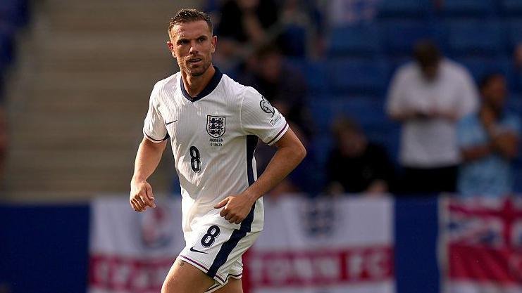 Jordan Henderson in action for England