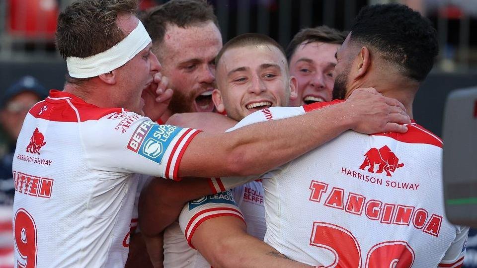 Mikey Lewis (centre) is mobbed by teammates after a superb solo try against St Helens in Hull KR's last game before the cup final