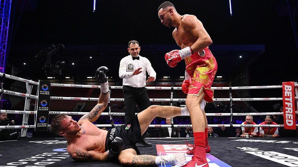 Callum Simpson stands over Ivan Zucco on the canvas
