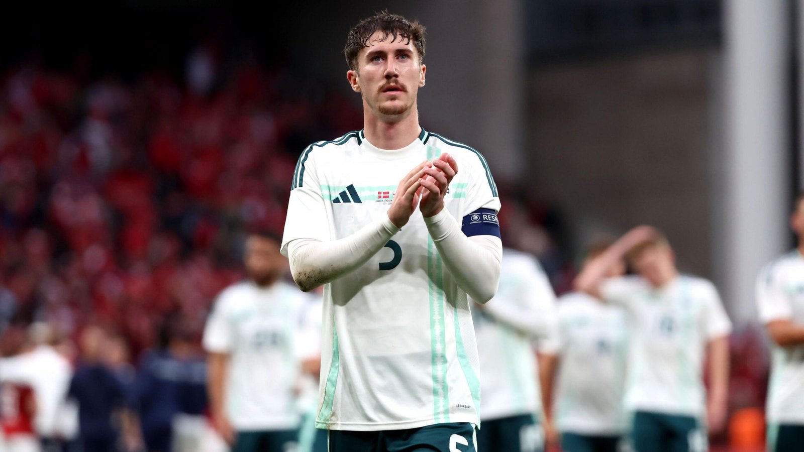 Trai Hume applauds Northern Ireland supporters