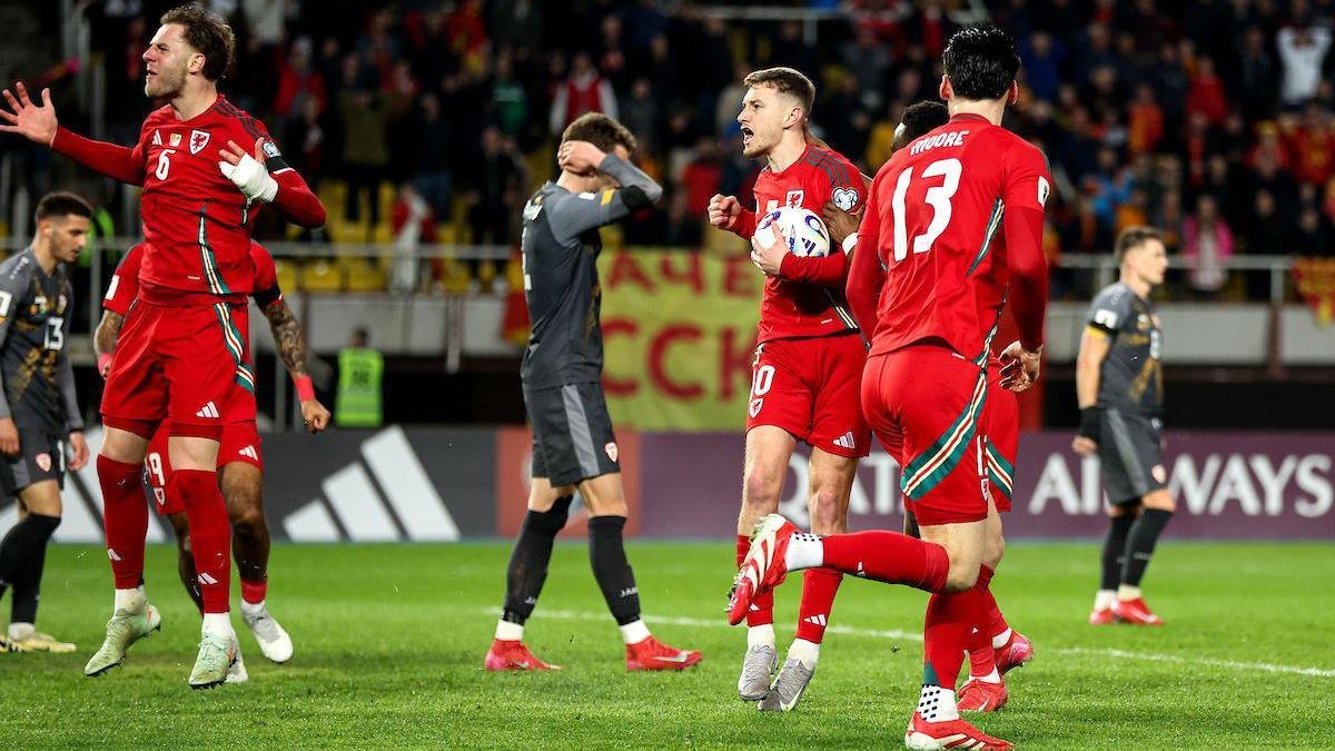 David Brooks celebrates his late equaliser in North Macedonia